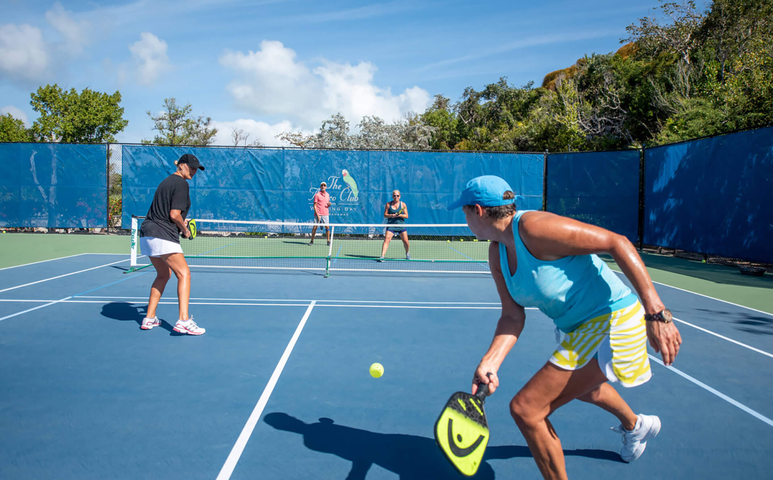 Pickleball game at The Abaco Club highlighting coastal living and club lifestyle