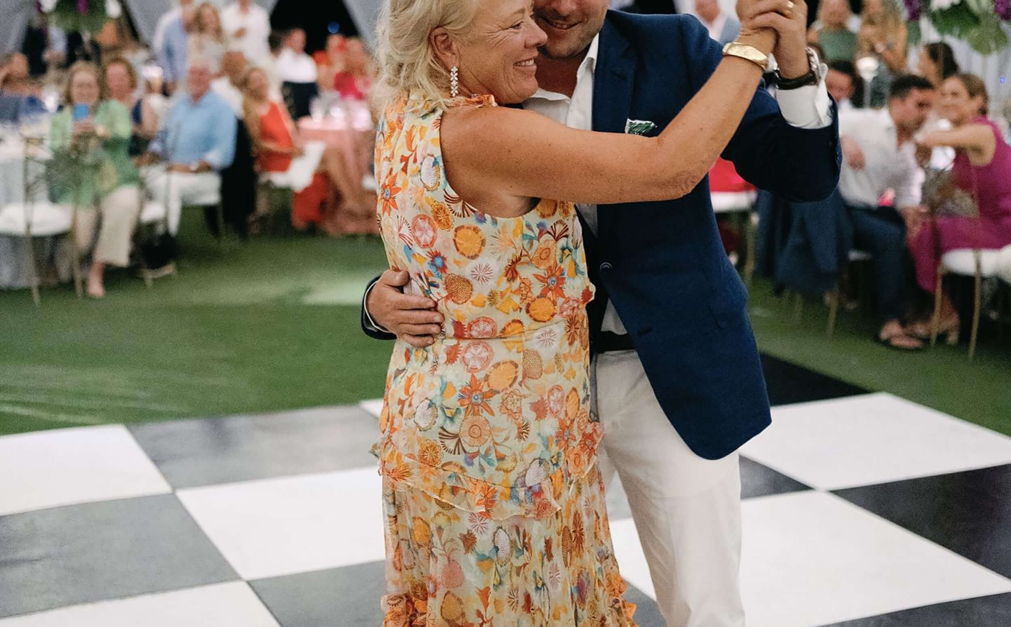 A couple dancing at an event in The Abaco Club