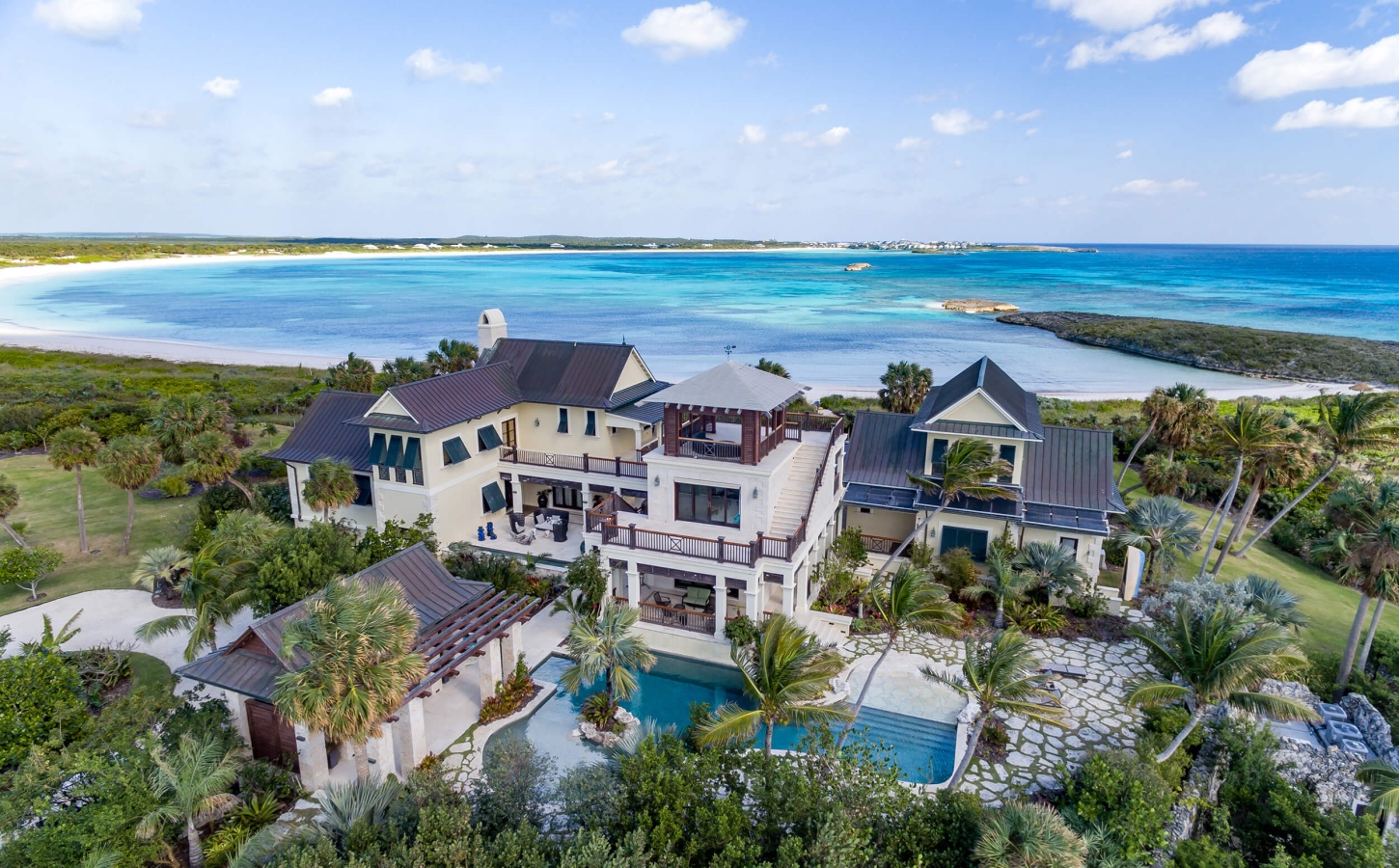 Aerial shot of the some of the properties at The Abaco Club with the Bahamian sea as a background