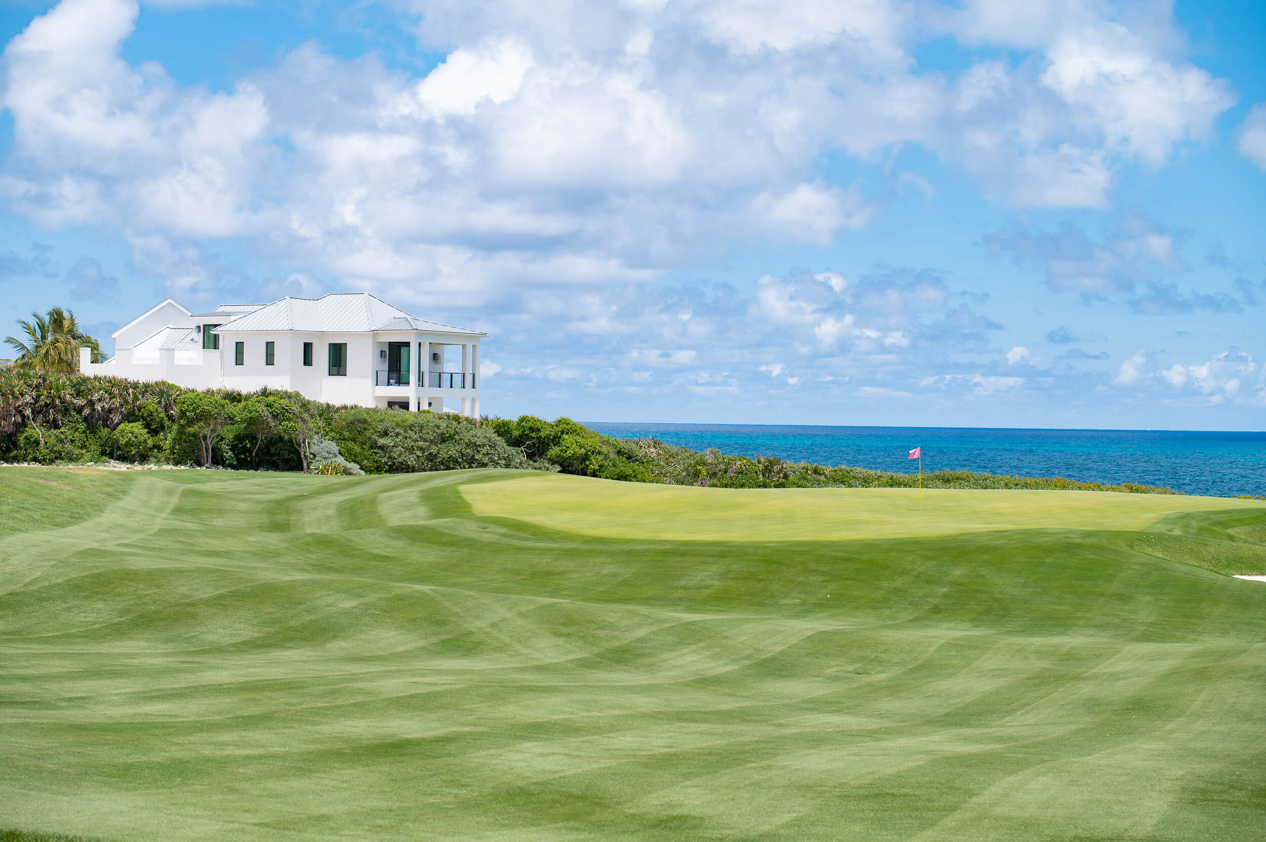 The Abaco Club Golf Course with the ocean on the background