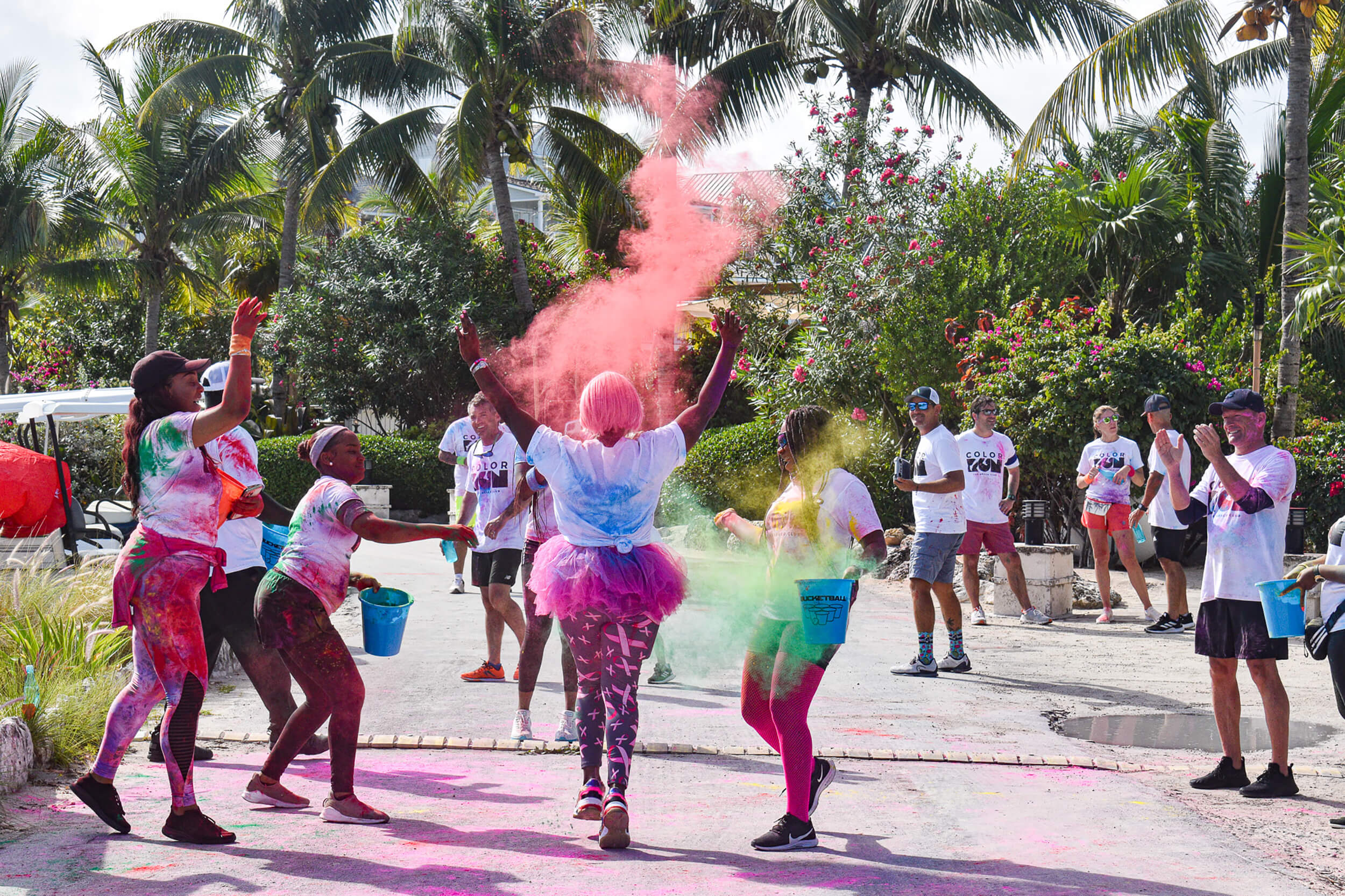 People enjoying a color run event at The Abaco Club