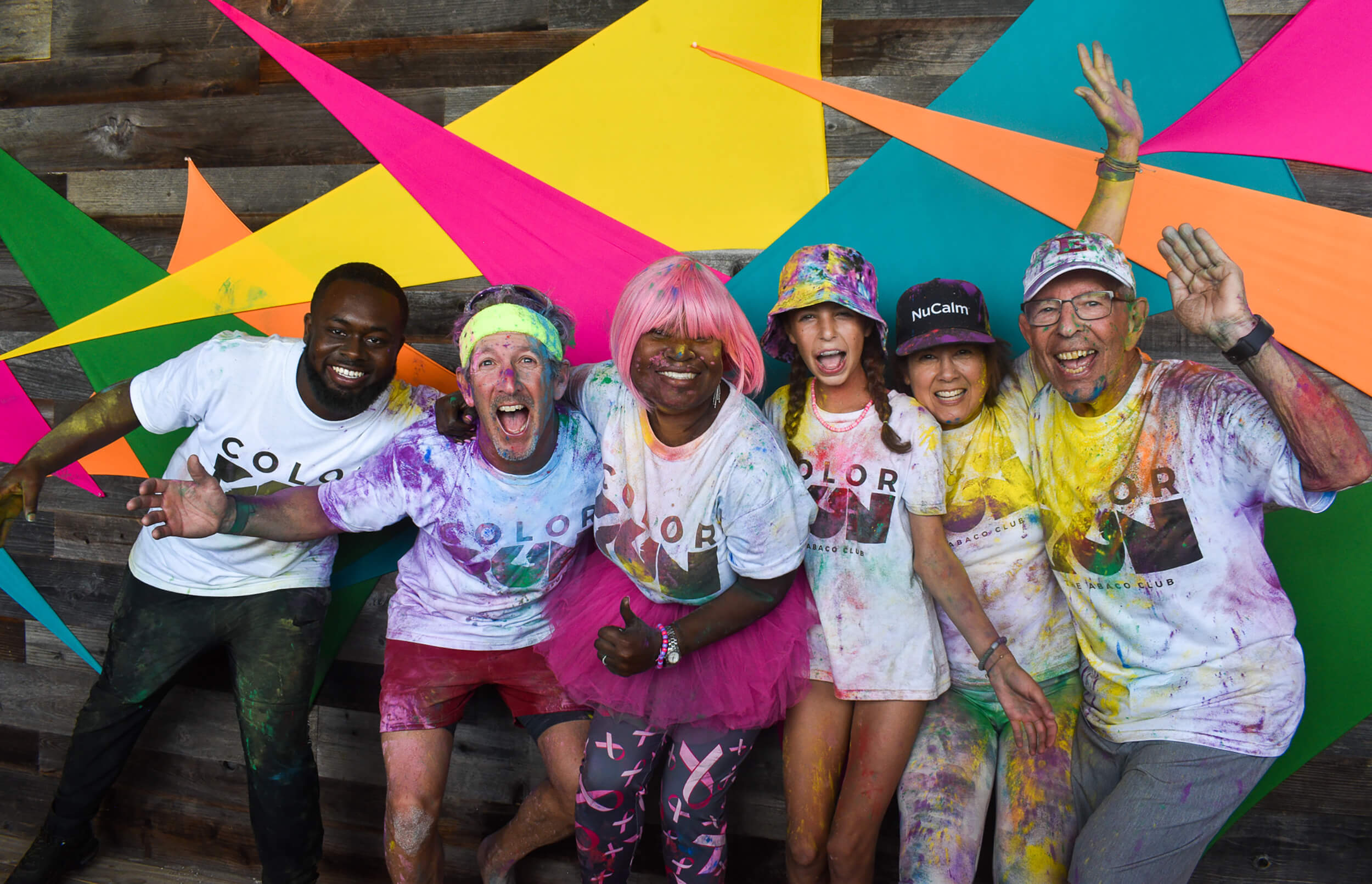 People enjoying a color run event at The Abaco Club