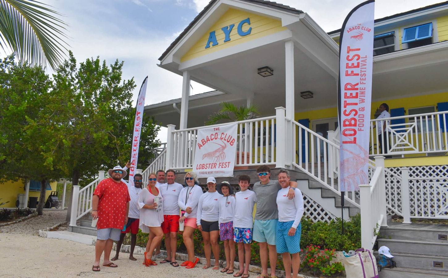 The Abaco Club members and staff posing at a lobster fest