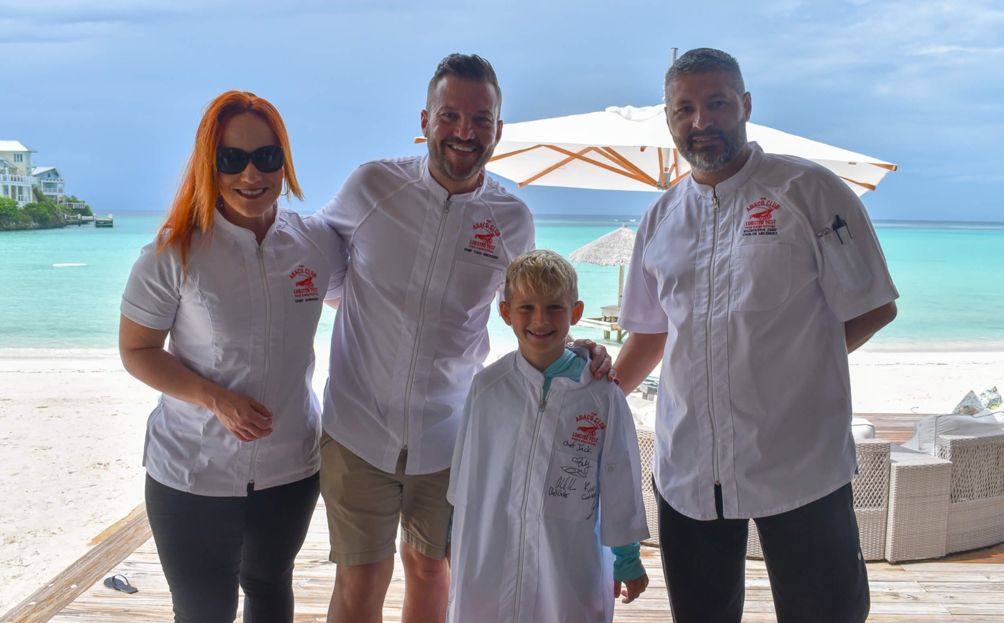 Family at a lobster fest event at The Abaco Club