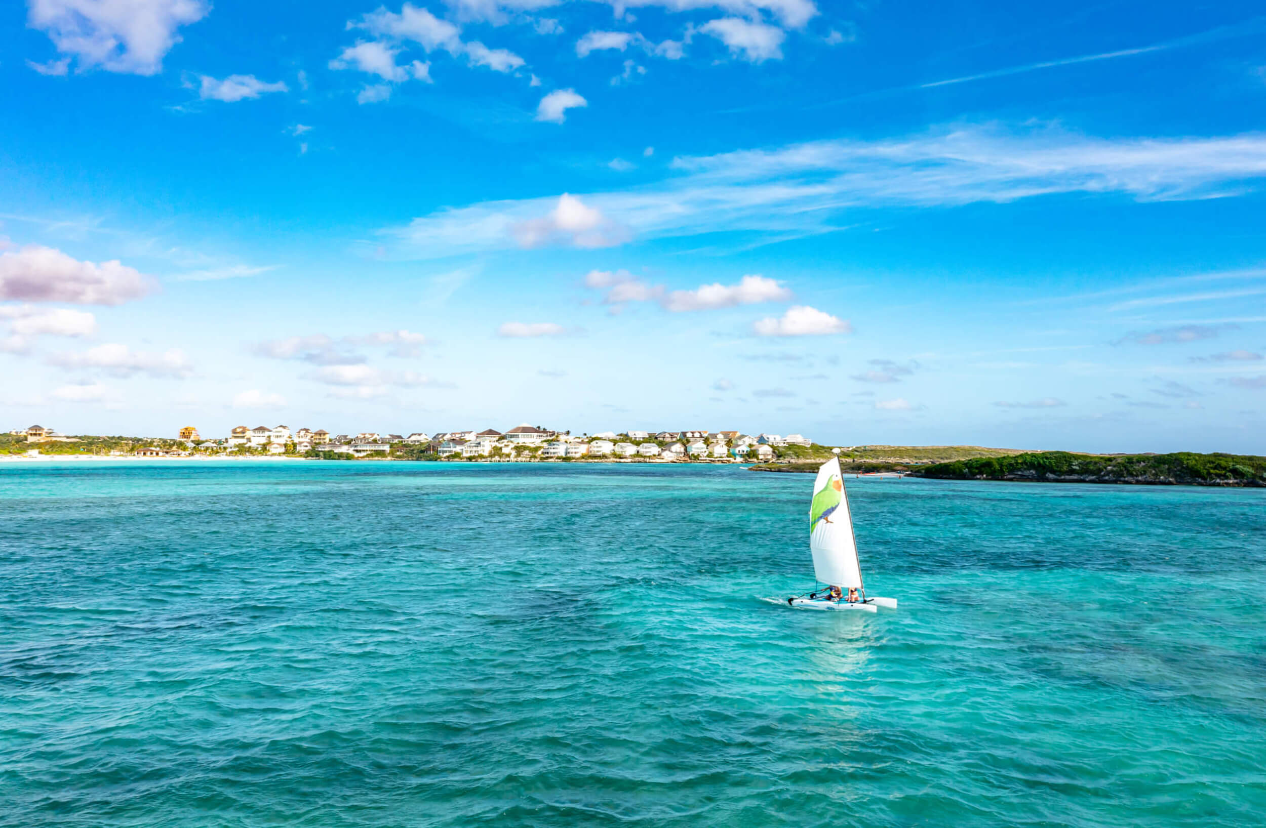 Image of a boat with The Abaco Club sign
