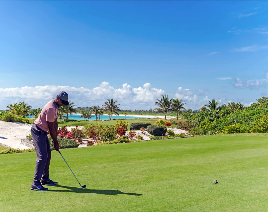 man golfing at The Abaco Club Golf Course