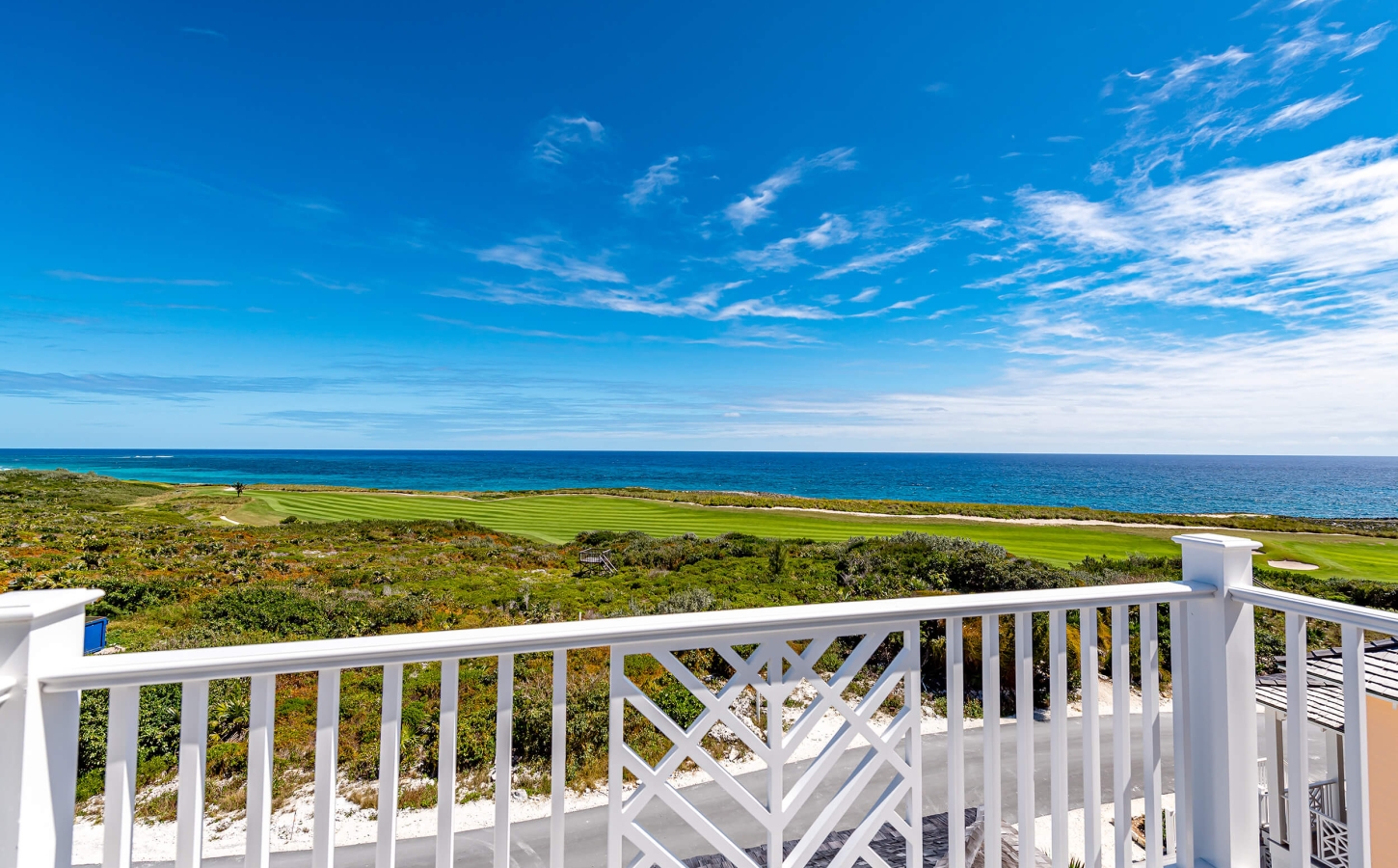 Golf course at The Abaco Club with ocean views, symbolizing the luxury of club lifestyle and coastal living