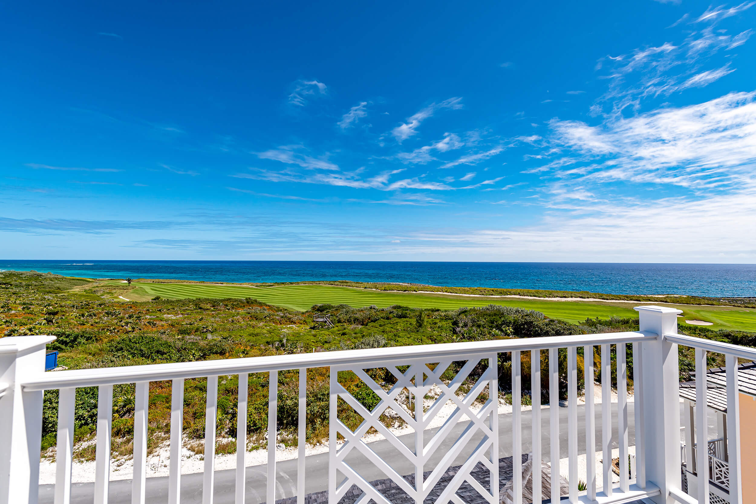 Golf course at The Abaco Club with ocean views, symbolizing the luxury of club lifestyle and coastal living