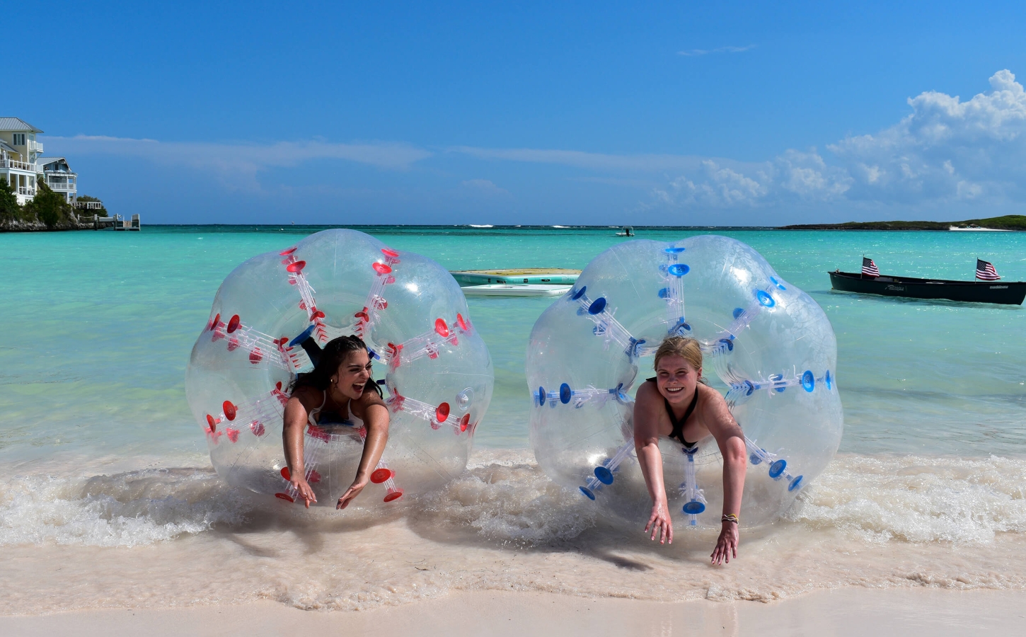 Two women enjoying watersports and living the club lifestyle at The Abaco Club