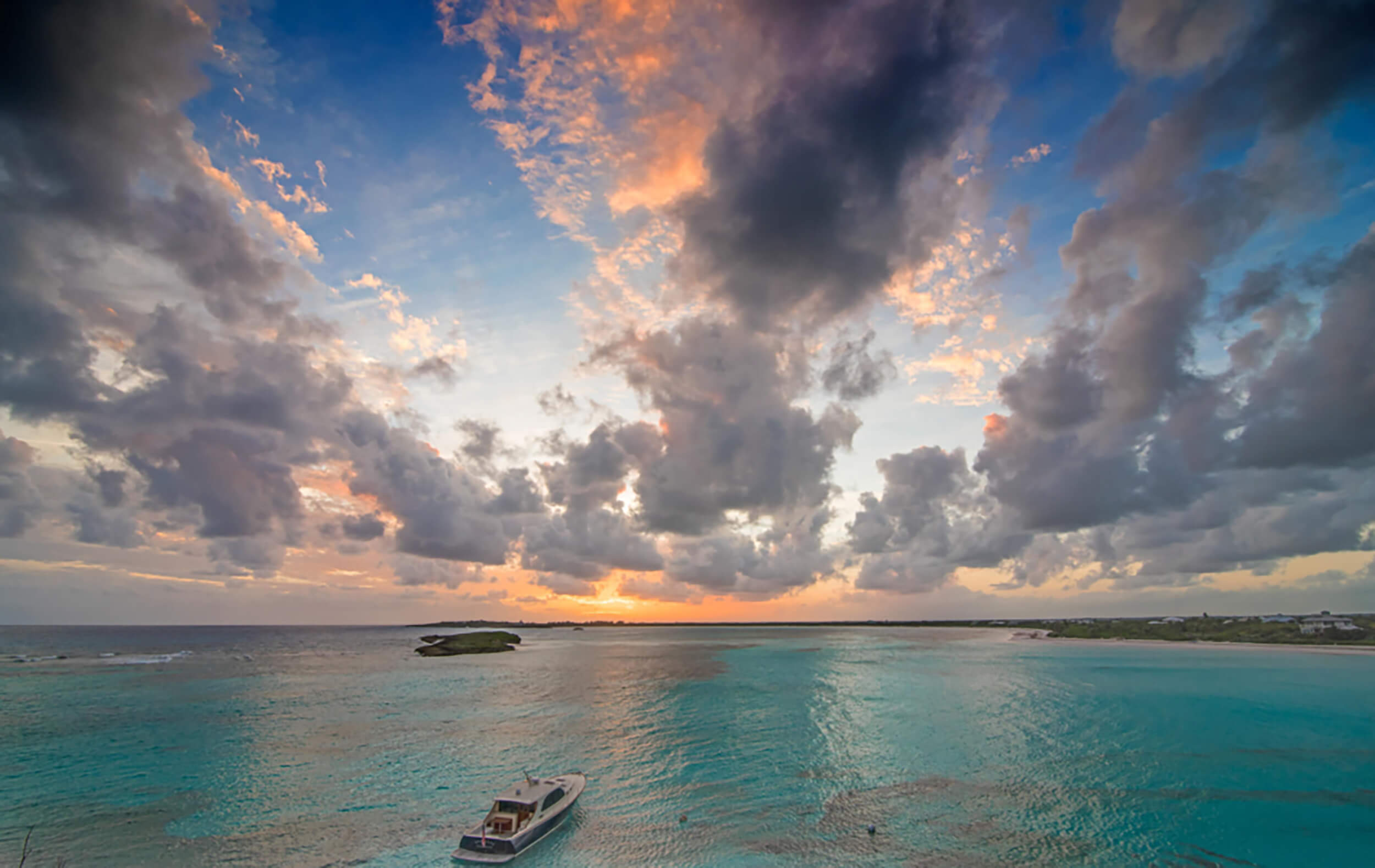 sunset view of the beach at The Abaco Club, capturing the essence of coastal living in The Bahamas