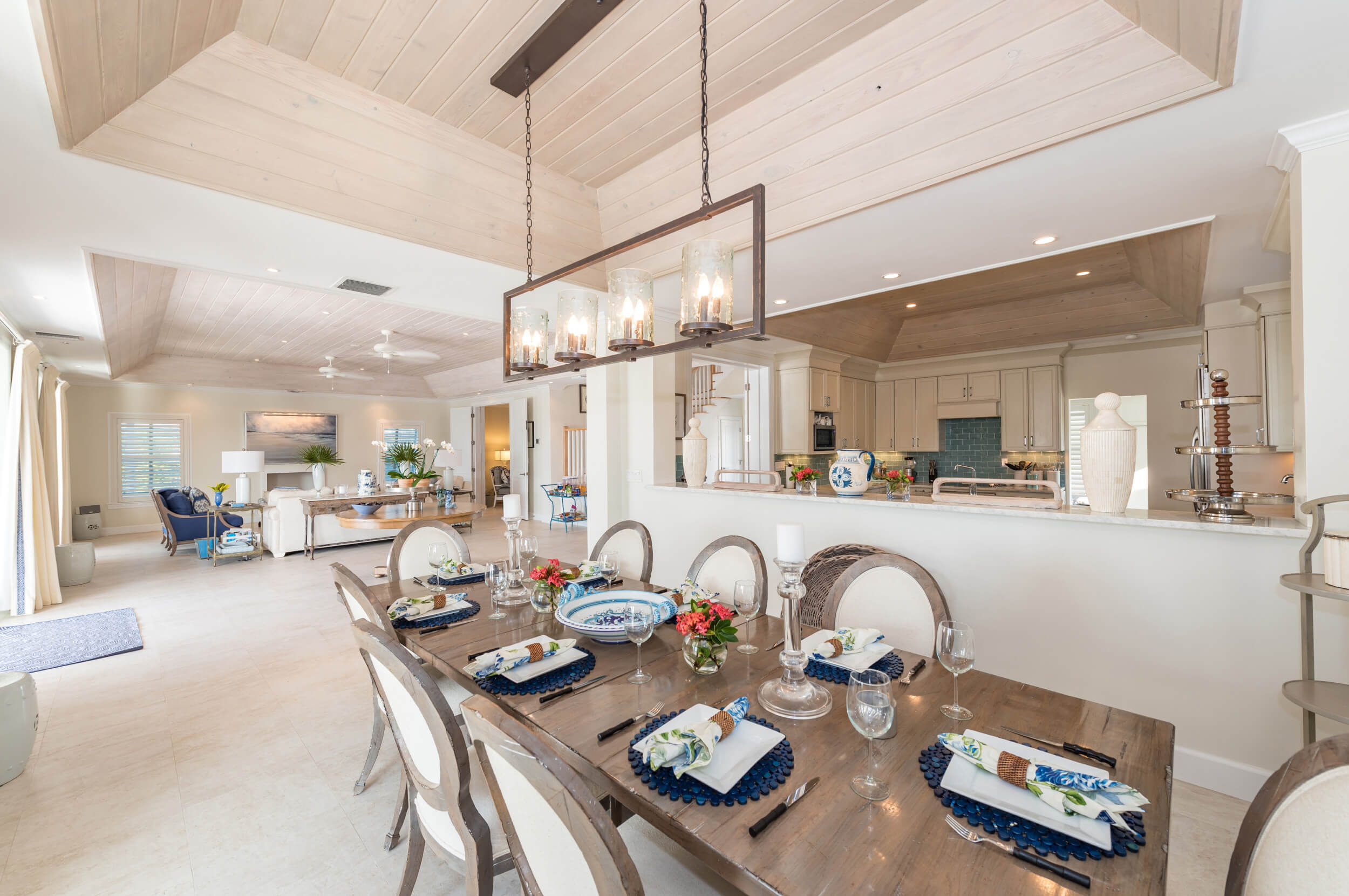 Open-concept dining and living space at The Abaco Club with chic decor, capturing the essence of modern coastal living in The Bahamas