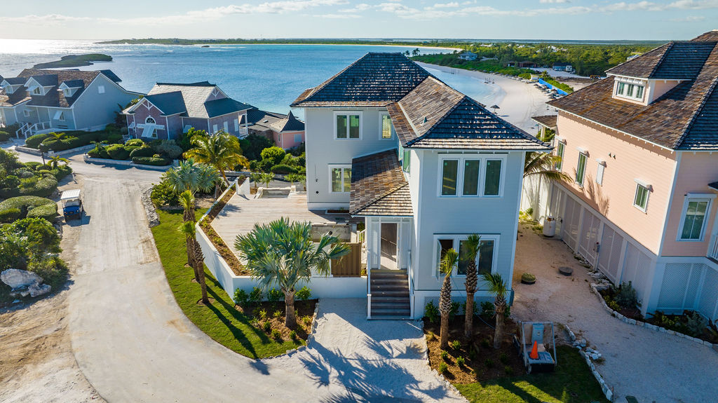 Aerial view of a beachfront cottage in The Ridge neighborhood at The Abaco Club