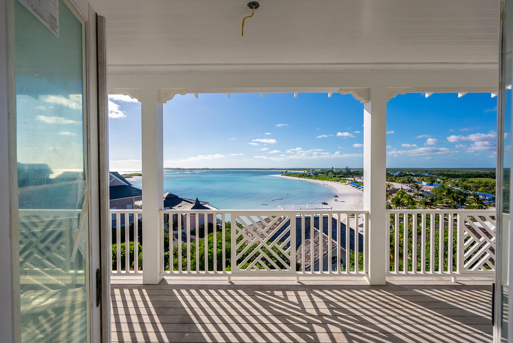 Balcony view of a beachfront property in The Ridge neighborhood at The Abaco Club