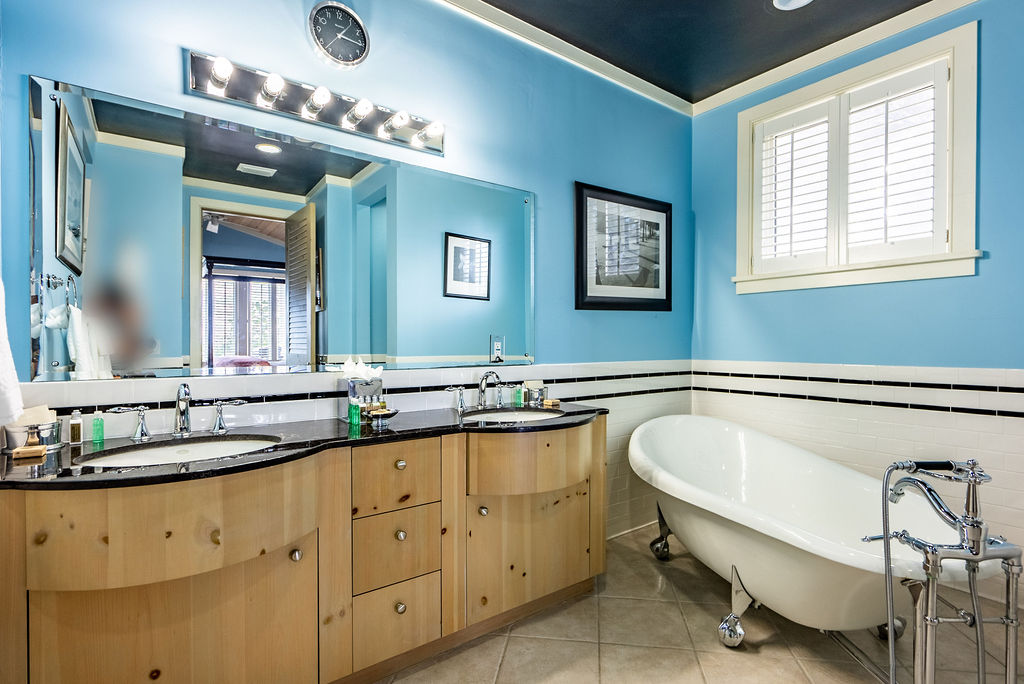 Elegant bathroom with luxurious spaces from a beachfront property in The Abaco Club