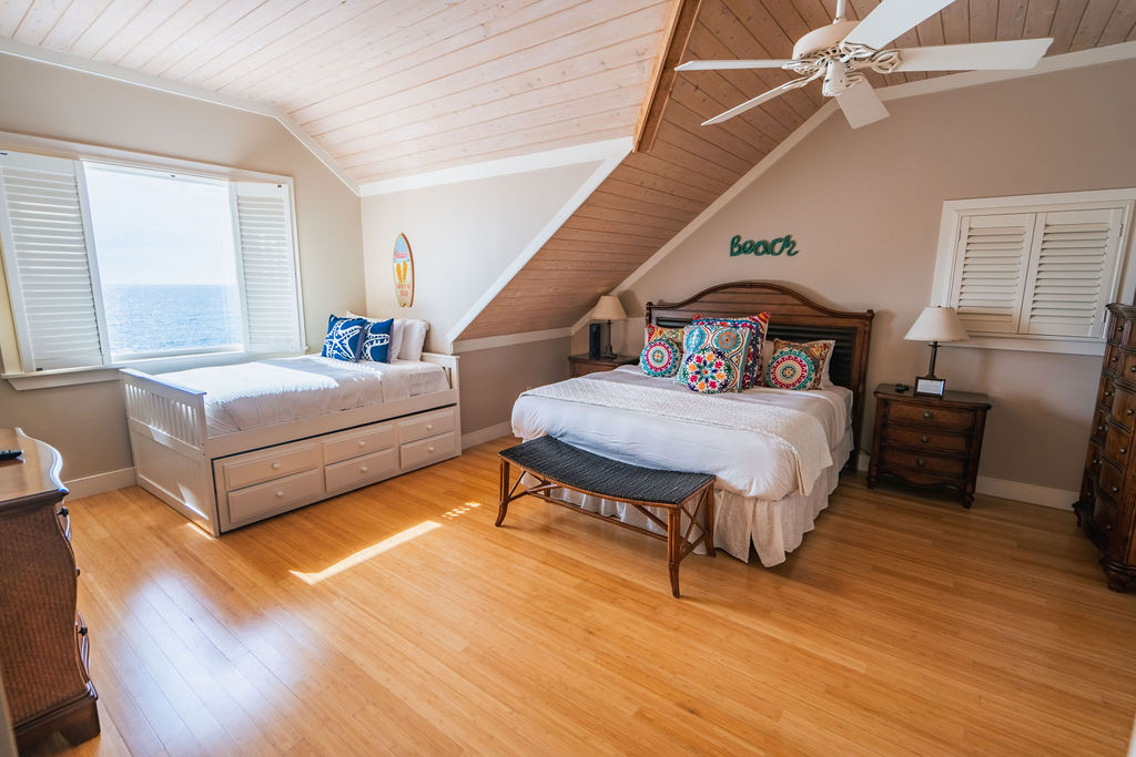 Elegant bedroom from a property at The Abaco Club overlooking the Bahamian sea