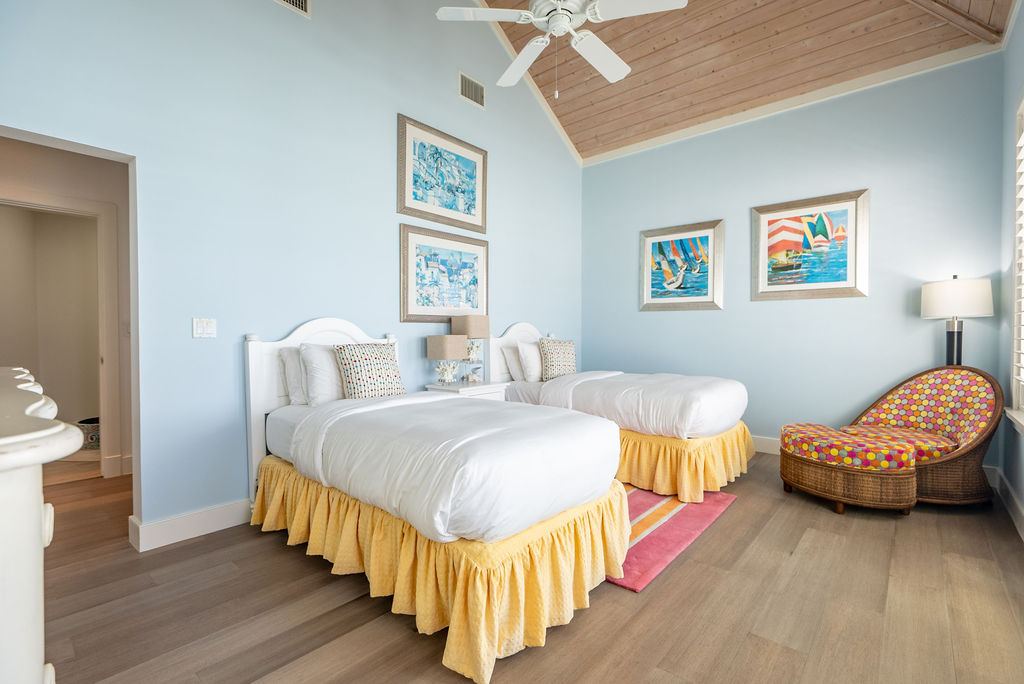 Spacious twin bedroom from one of the real estate properties at The Abaco Club
