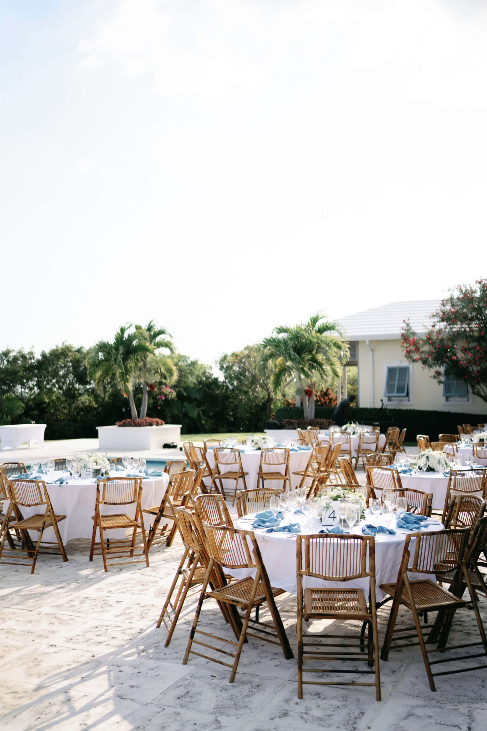 Elegant outdoor dining setup at The Abaco Club, capturing the essence of a luxurious coastal living environment