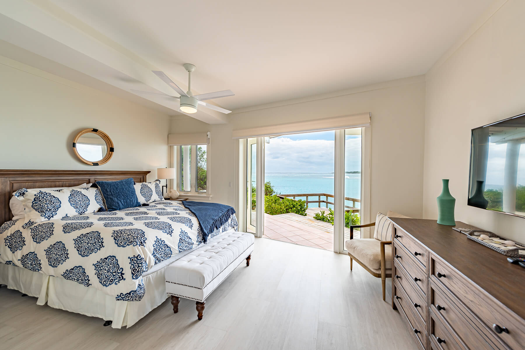 Image of a beachfront villa bedroom at The Abaco Club, showcasing peaceful coastal living in the Bahamas.