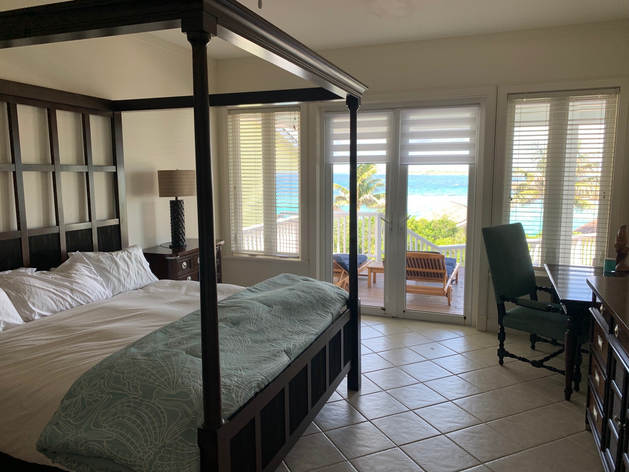 Bedroom of a beachfront property in The Abaco Club