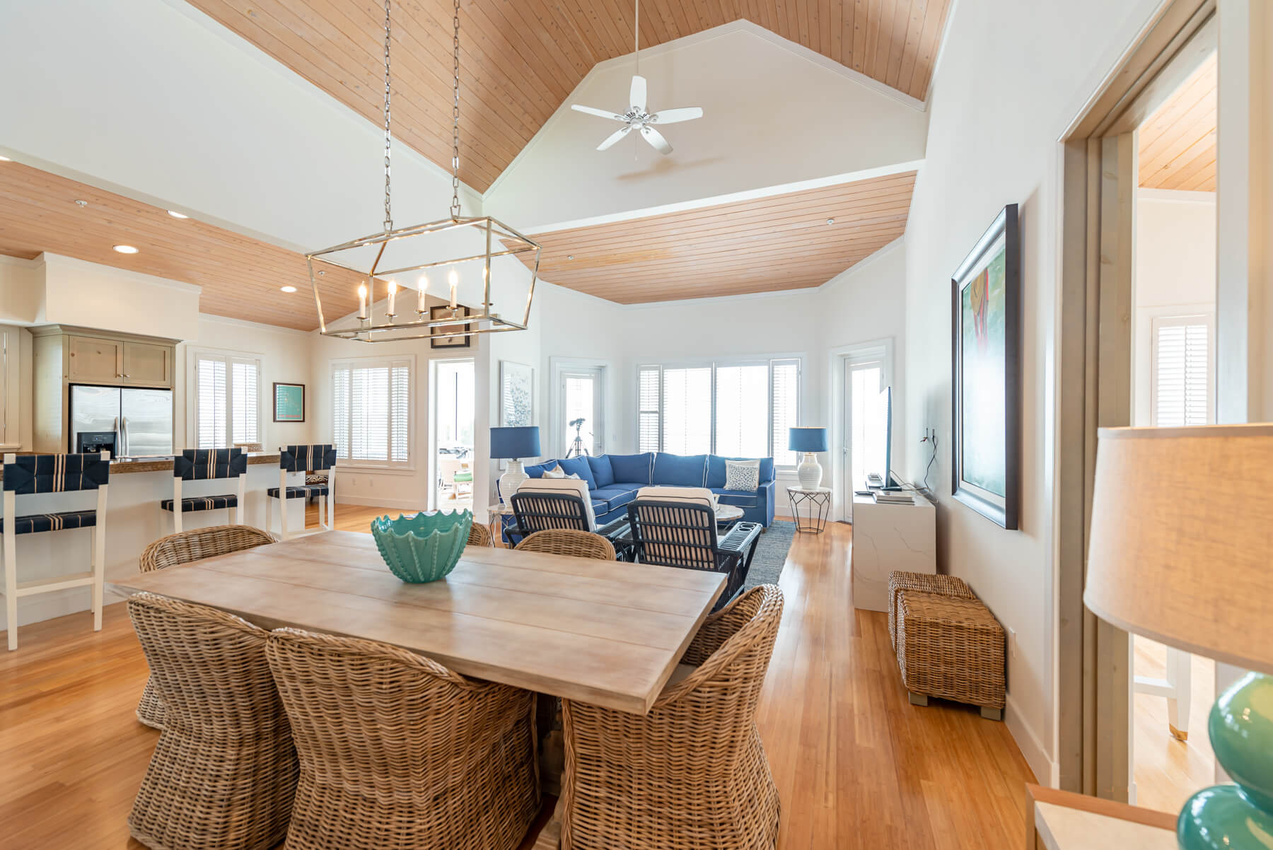 Yellowbird Abaco Club beachfront villa living room and dining room area.