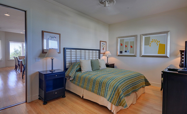 A bedroom from the Three Cheers property at The Abaco Club.