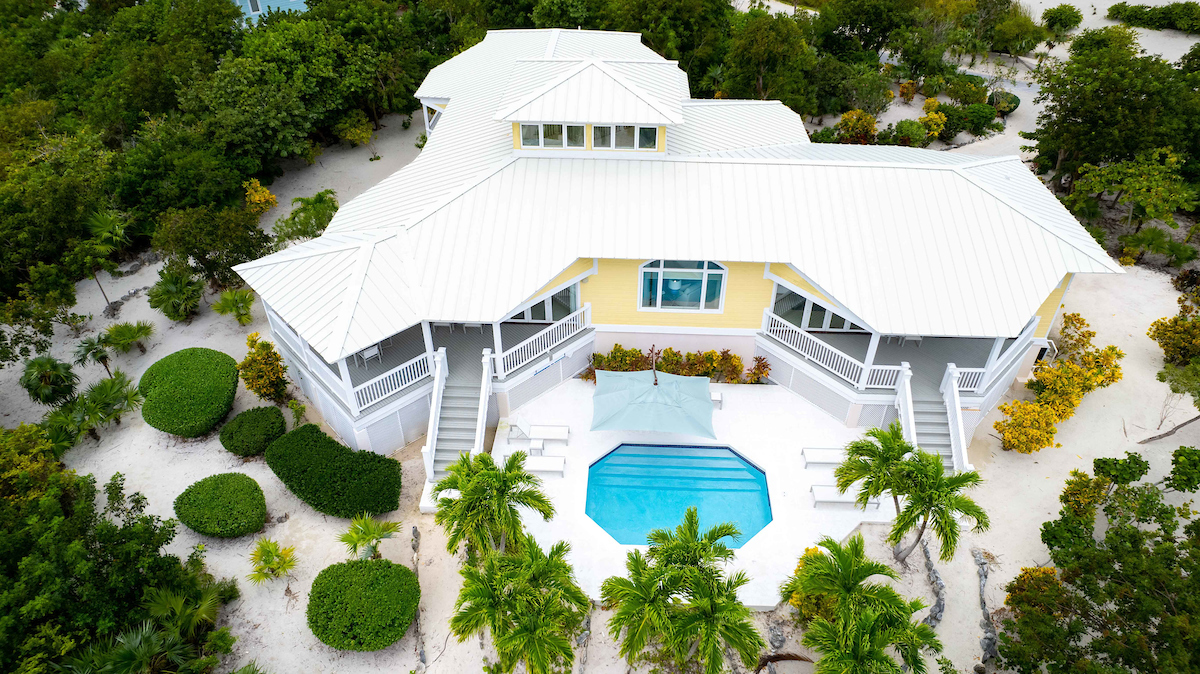 Aerial view of a beachfront property in The Bahamas