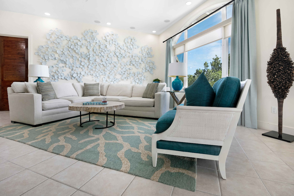 Spacious living room and resting area from a beachfront property at The Abaco Club.