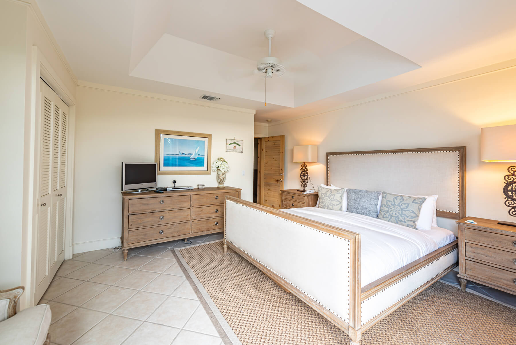 king bed and dresser of a property at The Abaco Club