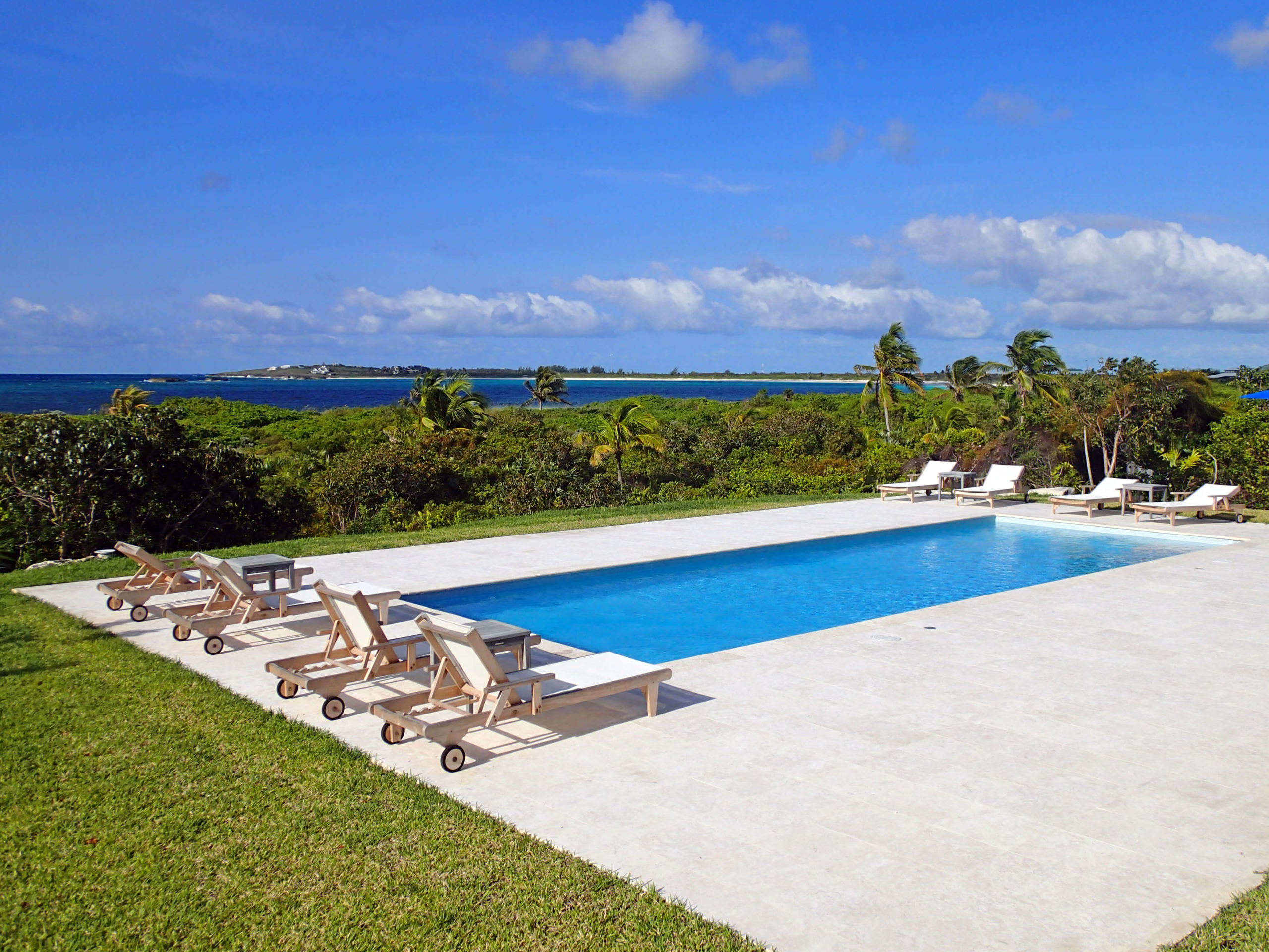 Pool with ocean view, showcasing the premium coastal living at The Abaco Club.